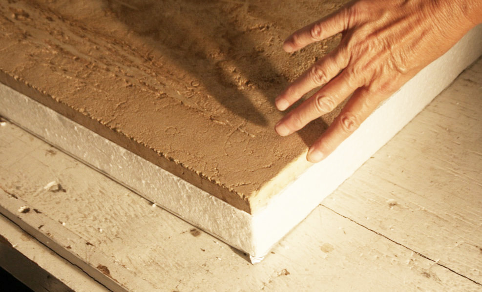 Picture showing the 3/4" thickness of the hand carved Jerusalem stone slab that was installed into Oprah Winfry's kitchen stove top in her Montecito, Ca mansion in 2003. Artist Jamie Santaniello  jamiesantaniello.com  Copyright©JS2003