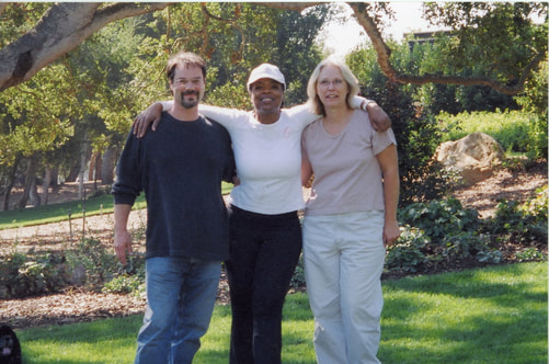 Oprah Winfrey with artists Frank and Jamie Santaniello under her favorite centuries old oak tree on her Montecioto Estate Oprah calls her Promised Land, formally called Tara ll..